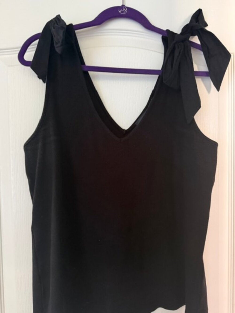 Black Maeve tank top with bows on the shoulders